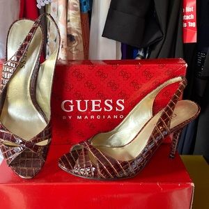 Beutiful guess sandals snack looks alike skin dark brown size 6 $30